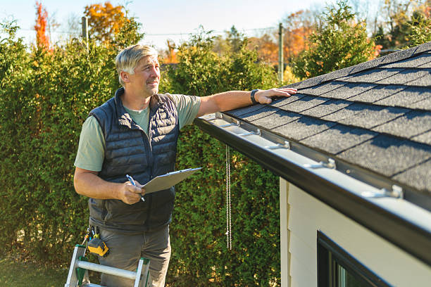 Professional Roofing technician working in Covel, WV